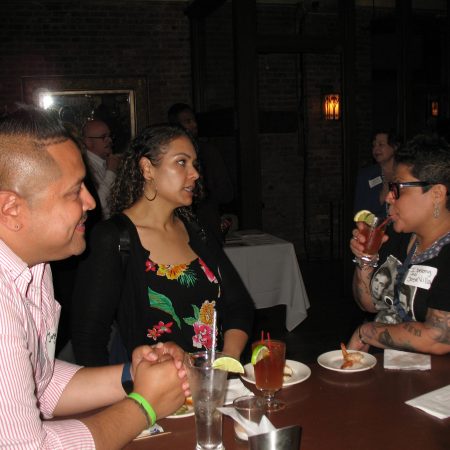 a group of people sitting at a table