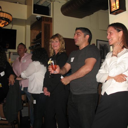 a group of people standing in a room