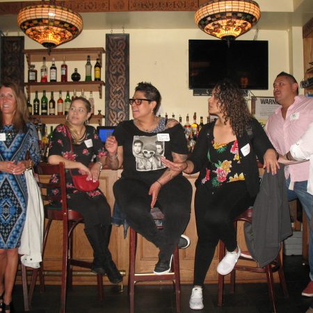 a group of people sitting in chairs