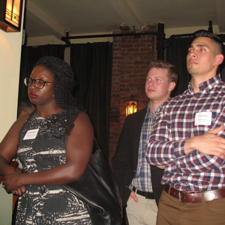 a group of people standing in a room