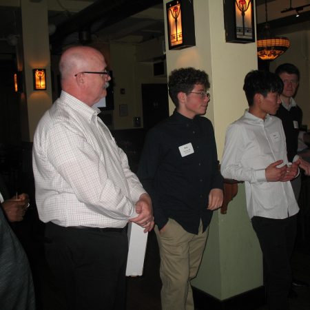 a group of people standing in a room