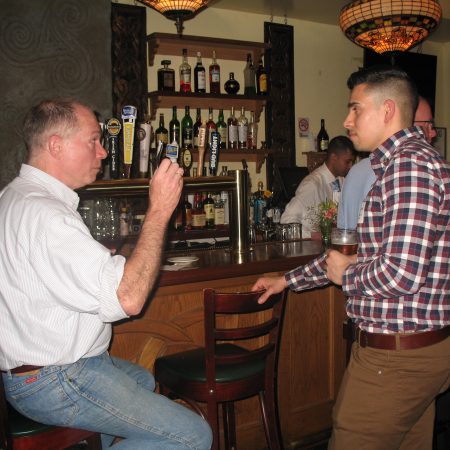 a person taking a picture of another person