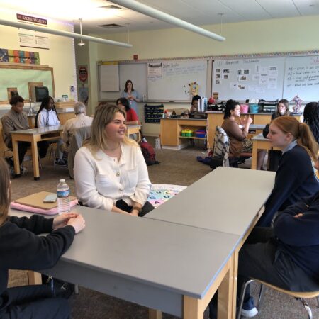 a group of people sitting at a table