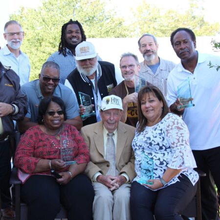 a group of people posing for a photo