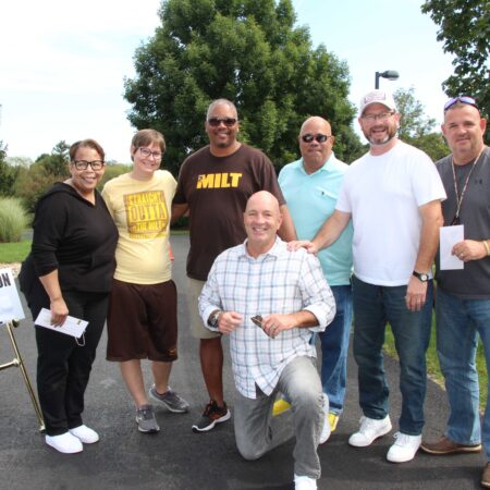 a group of people posing for a photo