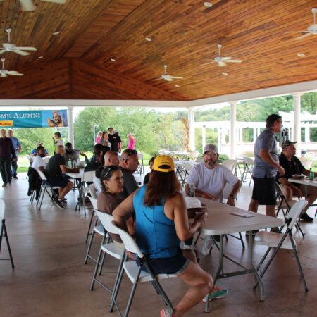 a group of people sitting at tables