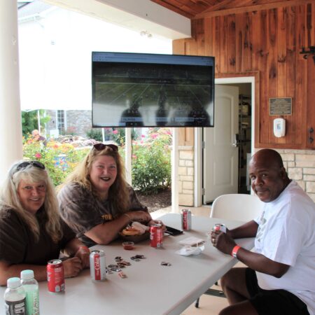 a group of people sitting at a table