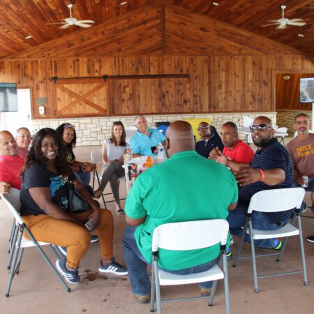 a group of people sitting in chairs