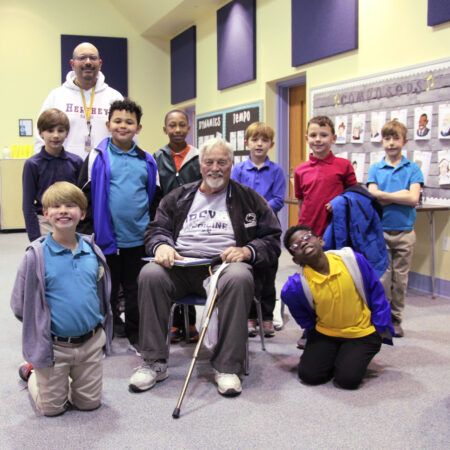 a group of children posing for a photo