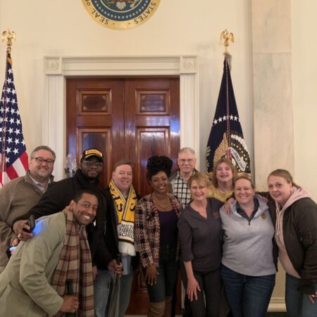 a group of people posing for a photo