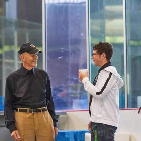 a person and a child talking