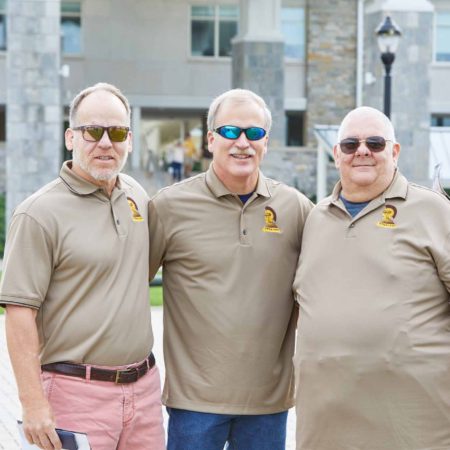 a group of men wearing sunglasses