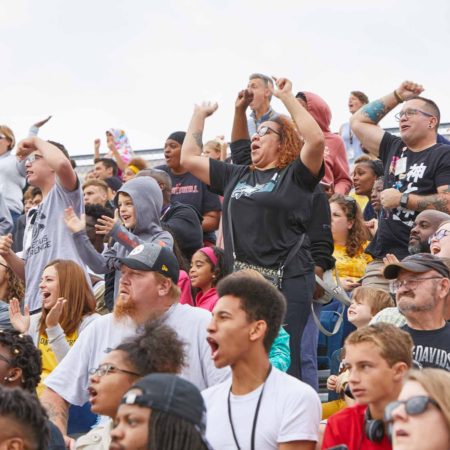 a group of people in a stadium