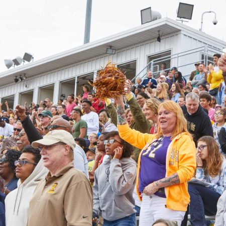 a group of people in a stadium