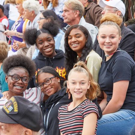 a group of people posing for a photo