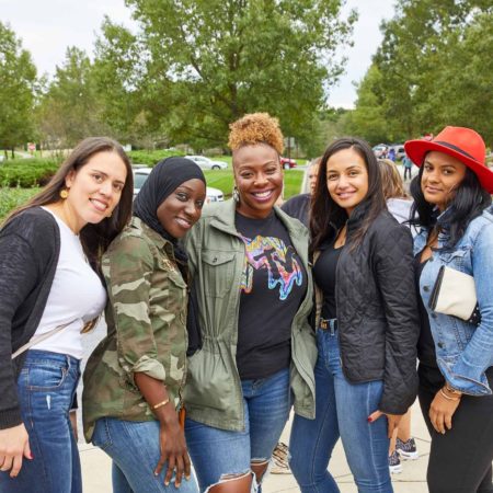 a group of women posing for a photo