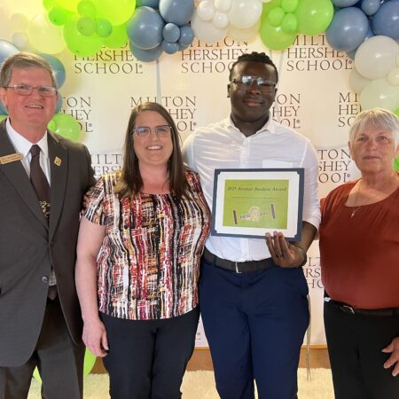 MHS senior Akinwole Akinfenwa receives the James Hanawalt ’65 Memorial Scholarship