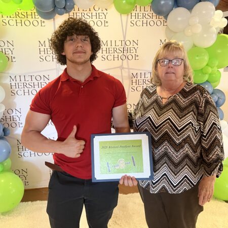 MHS senior Connor Rooney receives the John Jack Cleaver Award