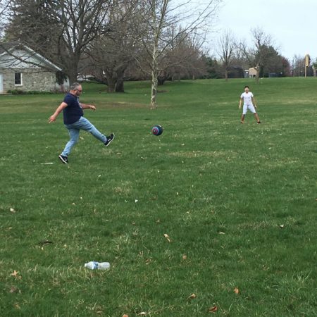 a group of people playing football
