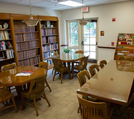 a room with tables and chairs