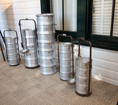 a group of metal containers