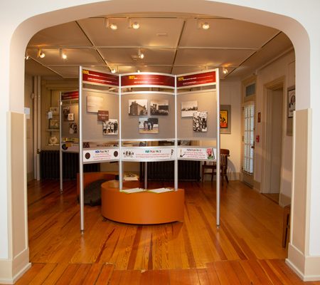 a room with a display of art