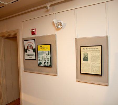 a wall with pictures on it