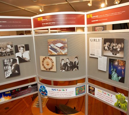a display of a room with signs and pictures