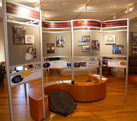 a room with a display of art