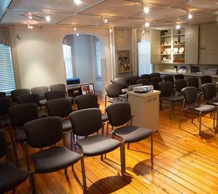 a room with chairs and a table