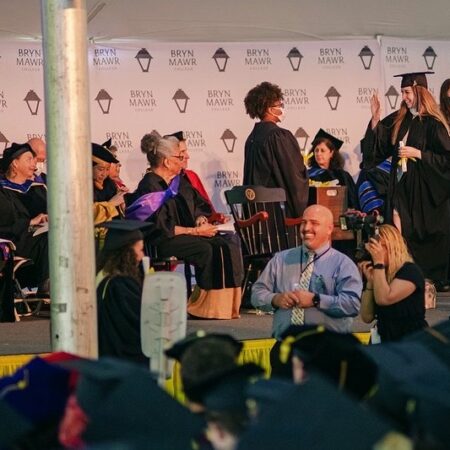 a group of people in graduation gowns