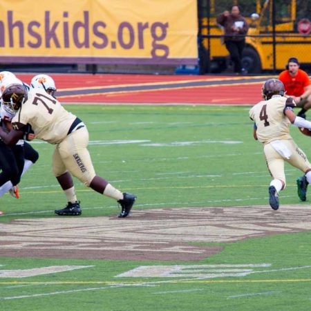a group of football players on a field