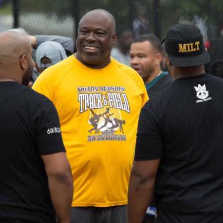 a person in a yellow shirt