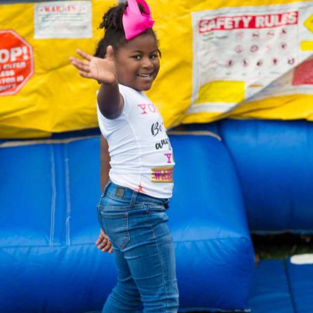 a child with her arms out
