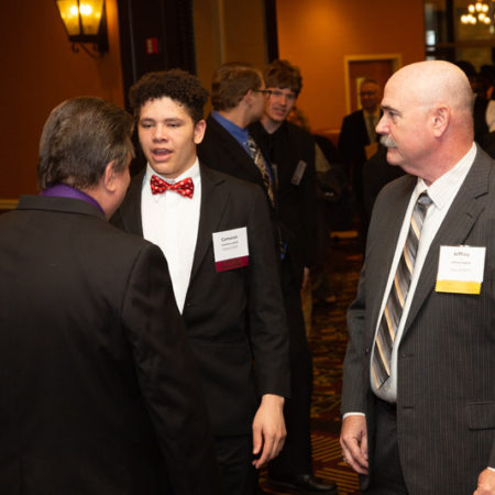 a group of men in suits