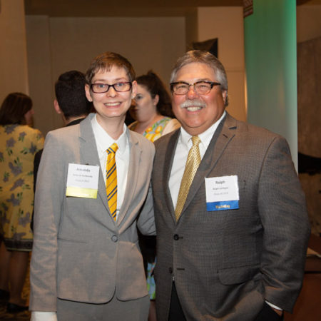 a person and child in suits