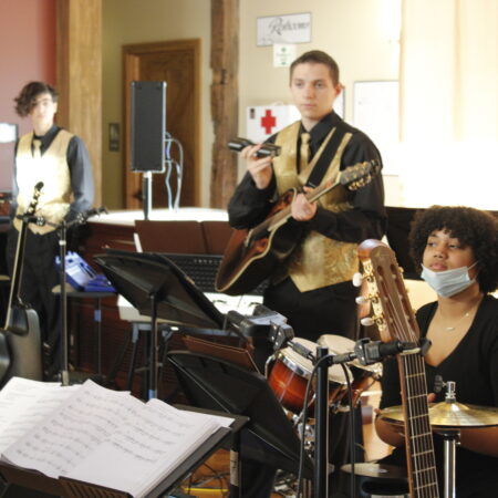 a group of people playing instruments
