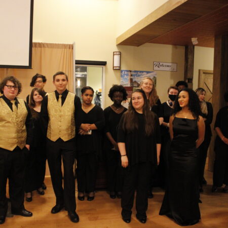 a group of people standing in a room