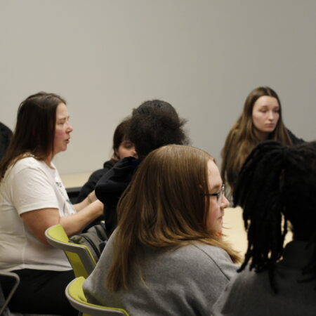 a group of people sitting in a room