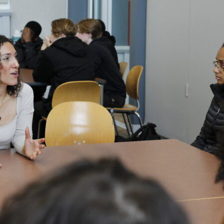 a group of people sitting at a table