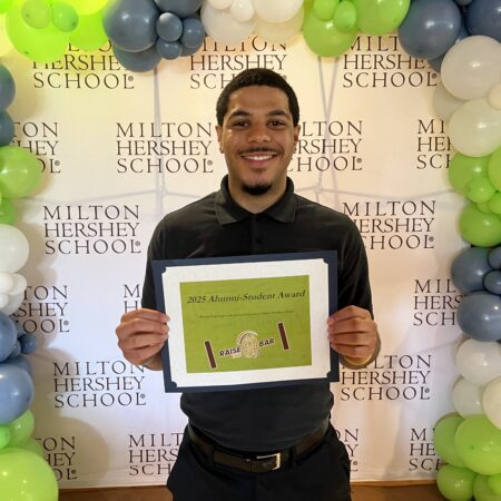 MHS senior Omar Perdomo receives a scholarship sponsored by the Dissinger Foundation