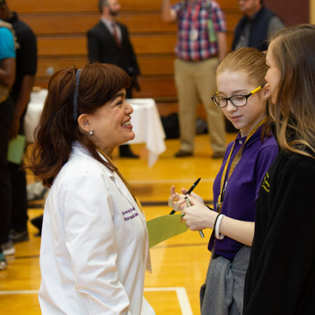 a person talking to a child