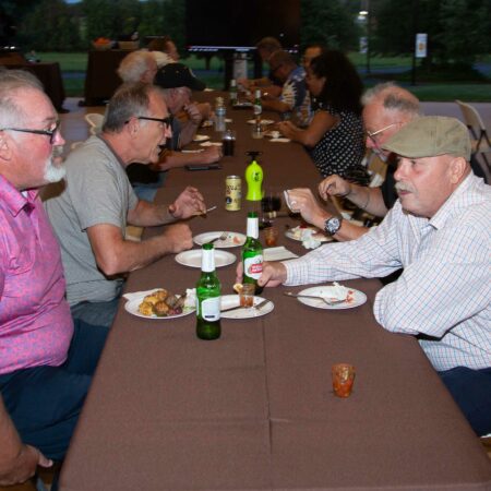 a group of people sitting at a table