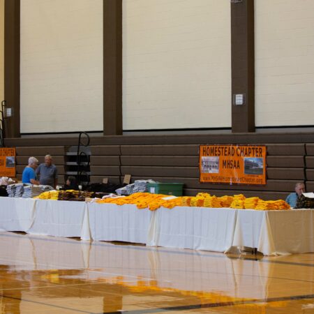 a table with yellow and white cloths
