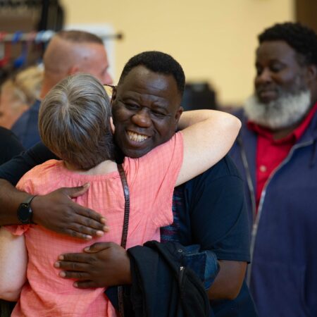 a person hugging a person