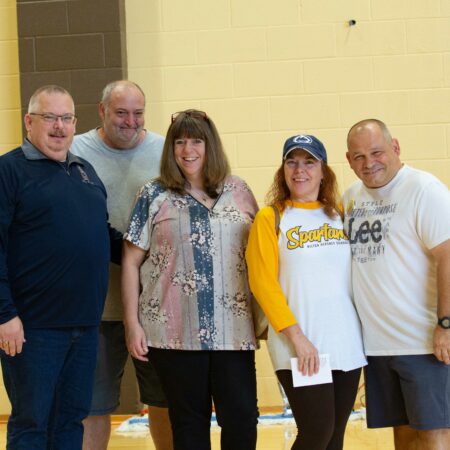 a group of people posing for a photo