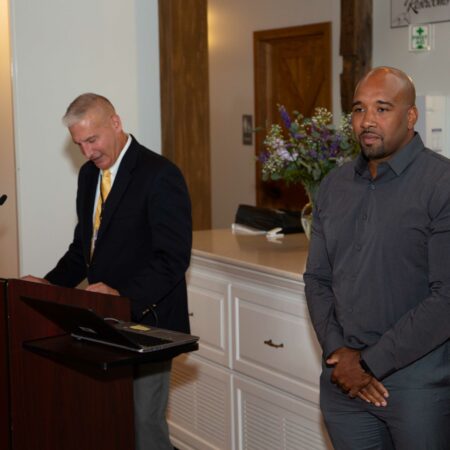 a person standing at a podium
