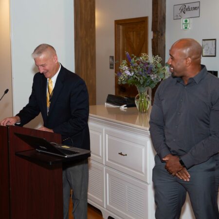 a person standing at a podium