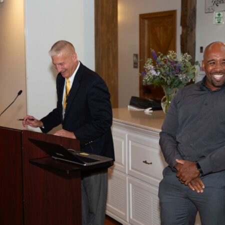 a person standing at a podium