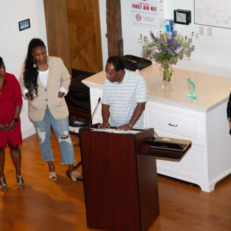 a person standing at a podium